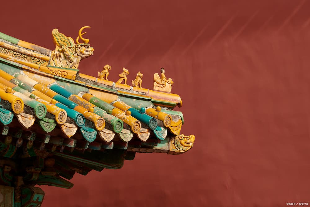 intricately painted beams in the Forbidden City's Hall of Supreme Harmony, featuring imperial dragon motifs in vibrant mineral pigments